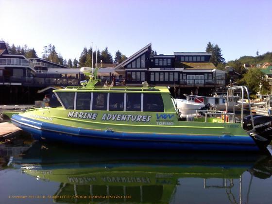 Enclosed aluminum RIB tour boat at Weigh West, Tofino